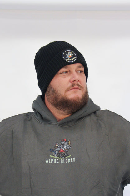 Man wearing a black beanie and gray hoodie with 'Alpha Blokes' logo on a white background